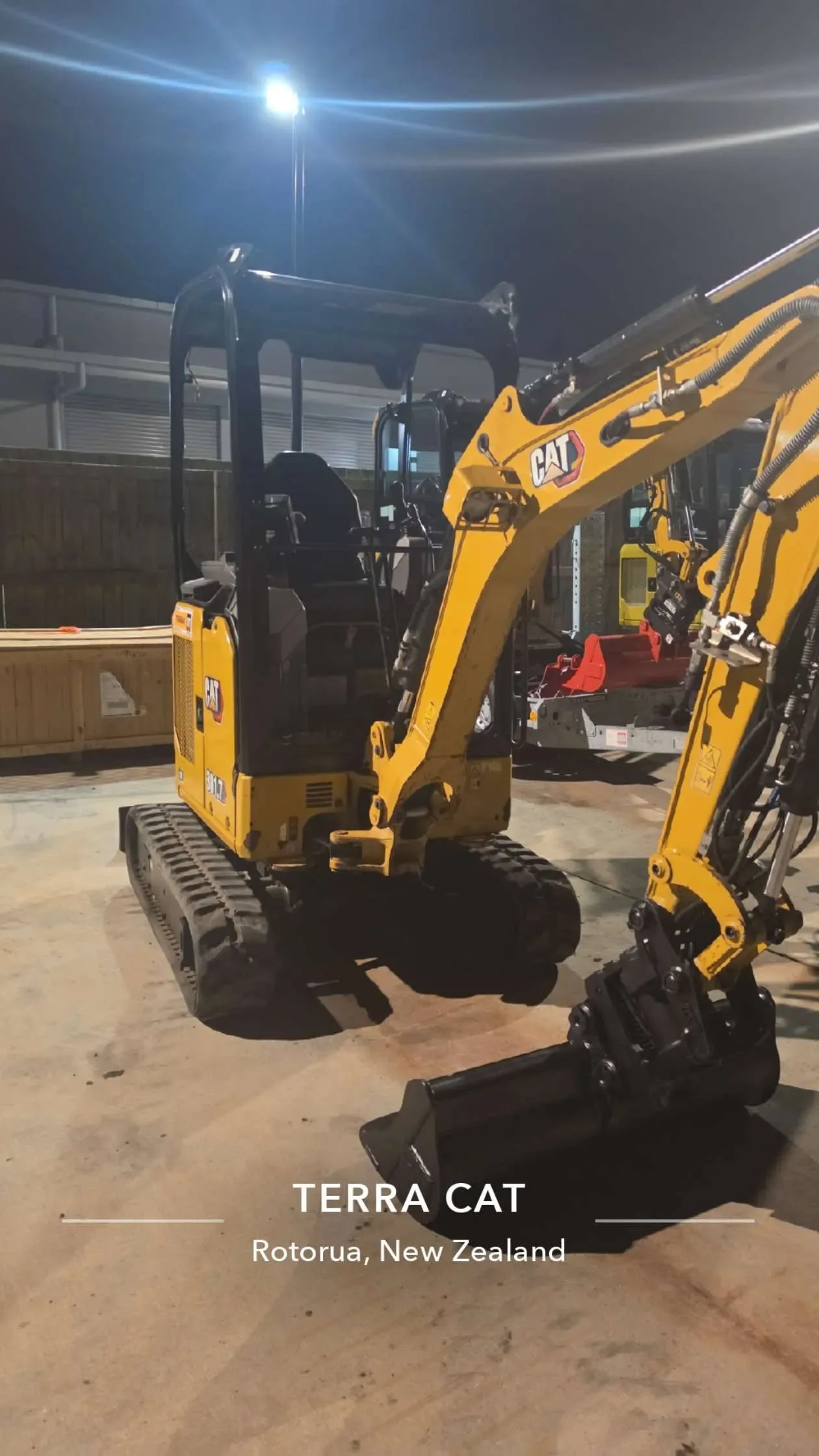 Mini excavator on site at 25 Derbridge Street landscaping project