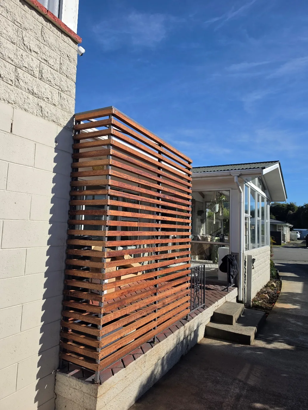 Timber screening and landscaping at 25 Derbridge Street, Christchurch