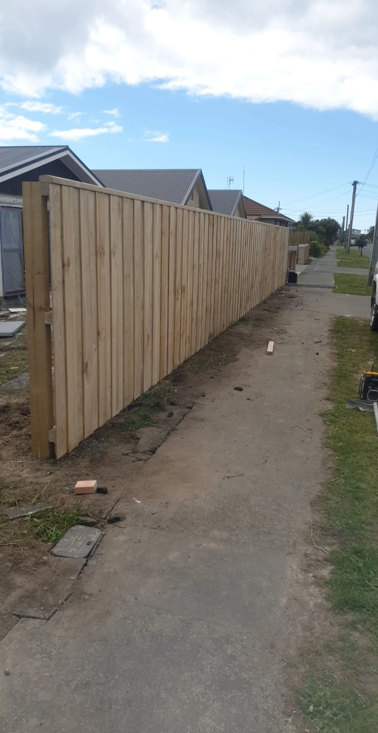 Completed timber boundary fencing at 25 Derbridge Street, Christchurch